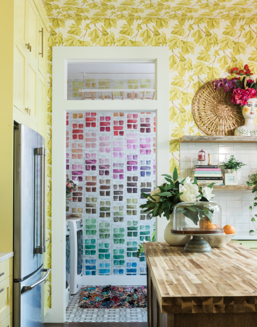 Colorful wallpapered room with a decorative feature wall